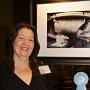 Mary DelPrincipe with her image, "One For The Road?"   (Photo by Jeanne Tompkins)